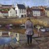 Lady looking at reflections in Crail harbour